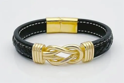 Entdecke das Knots Armband mit schwarzem Leder, weißen Nähten und goldenem Verschluss - dein stilvolles Statement-Piece!.