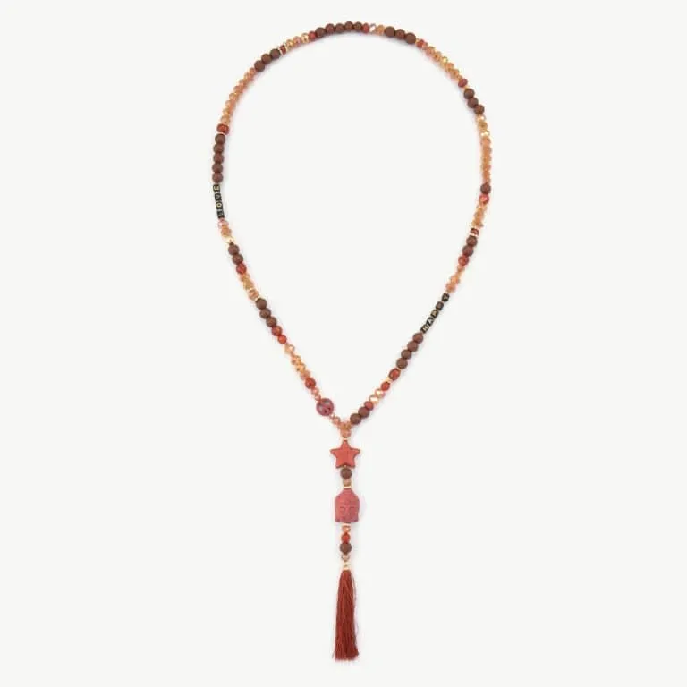 Entdecke das Boho Buddha Necklace - stylische orange-braune Perlen, einen trendigen Sternanhänger & rote Quaste für deinen Look!.