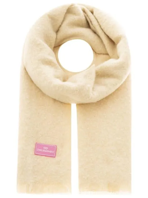 Entdecke den beigen Wollschal mit pinkem 