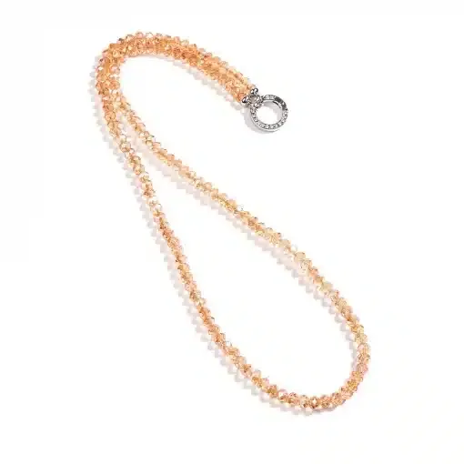 Entdecke deine elegante Vario Kette: Facettierte Perlen in Pfirsich, stilvoll mit rundem Silberverschluss - zeitgemäß und edel.