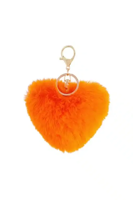Entdecke dein neues Lieblings-Accessoire: Der flauschige Herz-Schlüsselanhänger in Orange mit goldenem Ring - stylish & trendy!.