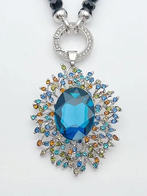 Erlebe den Blue Diamond Wechsel Anhänger: Dein Statement-Stück mit großem blauen Edelstein und funkelnden, farbigen Kristallen!.