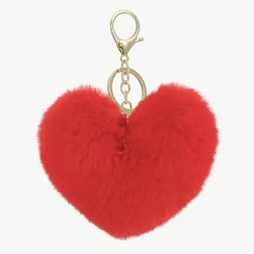 Verleihe deinem Look das gewisse Etwas: Der flauschige rote Herzanhänger mit Goldverschluss peppt Taschen und Schlüssel stilvoll auf!.