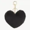 Verleihe deinem Style das gewisse Etwas - mit diesem flauschigen, schwarzen Herz-Anhänger und edlem Goldverschluss!.