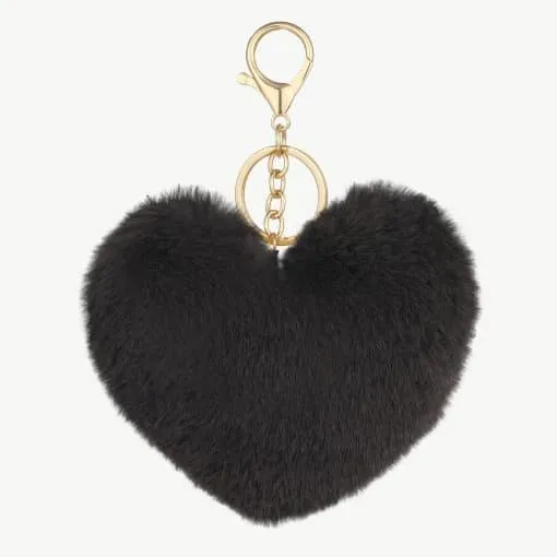 Verleihe deinem Style das gewisse Etwas - mit diesem flauschigen, schwarzen Herz-Anhänger und edlem Goldverschluss!.