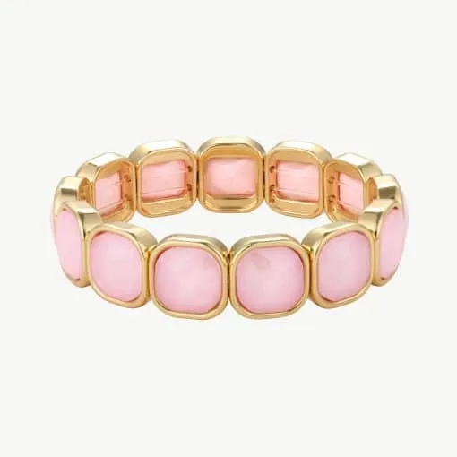 Erlebe modernen Luxus: Tragen Sie dieses goldene Armband mit stylisch eingefassten, pinken Edelsteinen als ausdrucksstarkes Statement!.