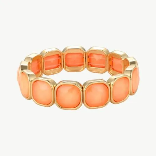 Erlebe modernen Luxus: Trage dieses goldene Armband mit leuchtend orangen Steinen und setze ein stylishes Statement!.