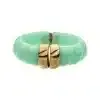 Setze ein Statement mit diesem klobigen Armreif in Mintgrün und goldenen Akzenten - das perfekte Trend-Piece für deinen Look!.
