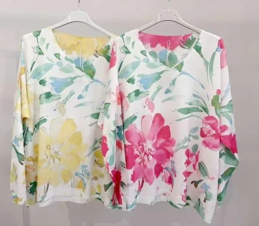 Tauche ein in die Trendwelt: Wähle dein Longsleeve mit ausdrucksstarkem Aquarell-Print in Gelb oder Pink!.