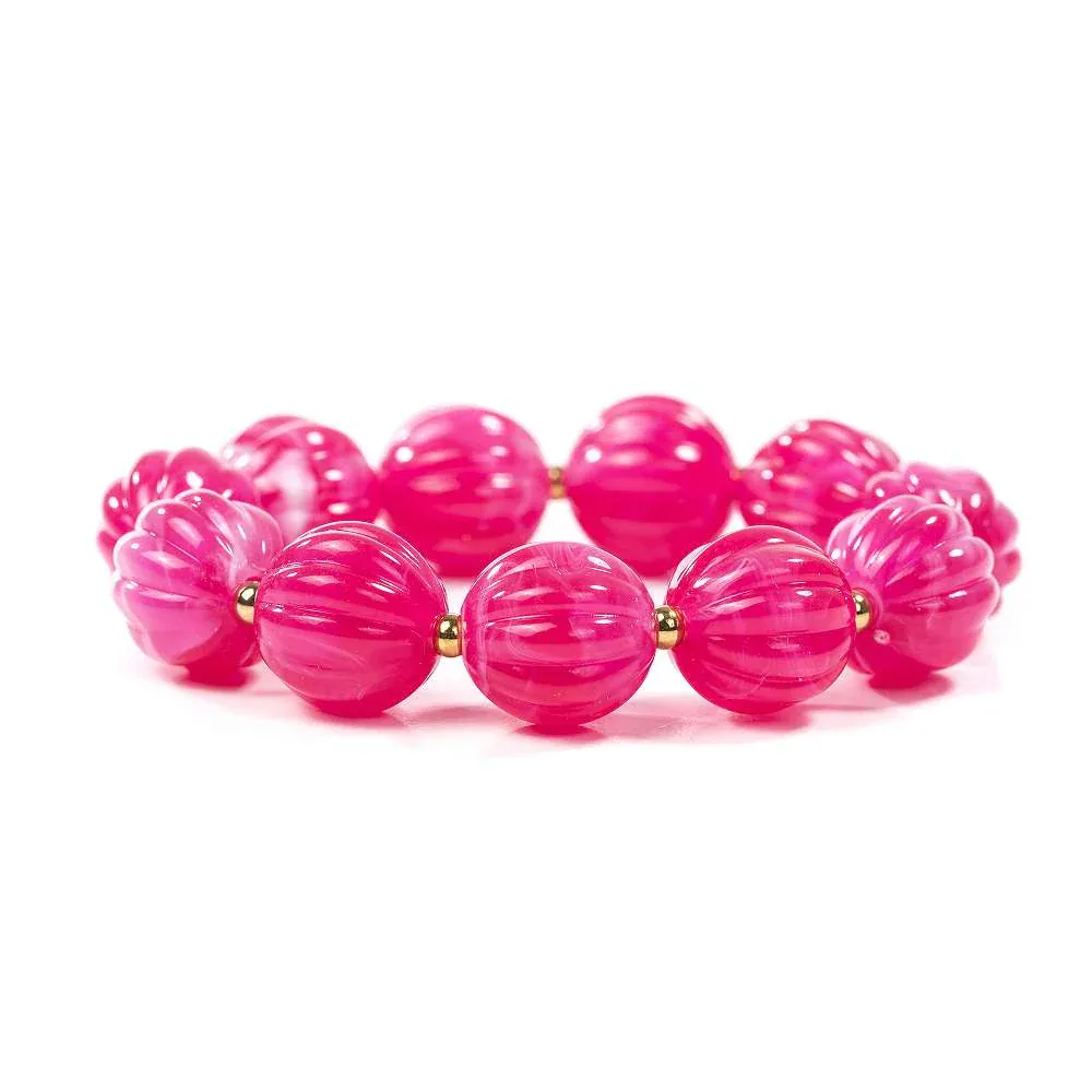 Candy Glow Armband: Rosa Kugelarmband mit goldenen Akzenten, modisches Schmuckstück.
